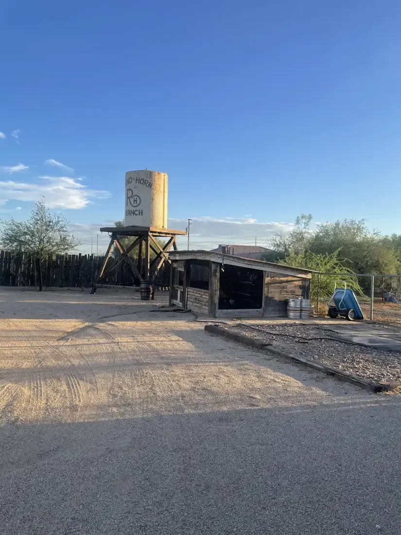 The water tower and ranch buildings at Round the Horn Ranch